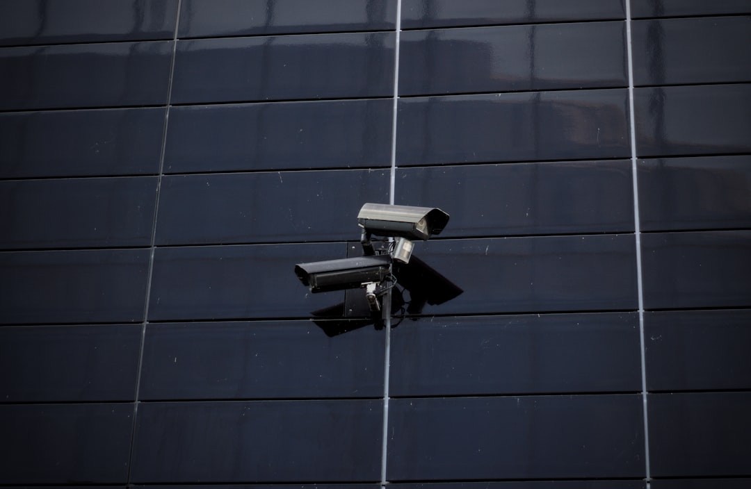 Enterprise-grade security control room with multi-screen surveillance monitoring and access management systems